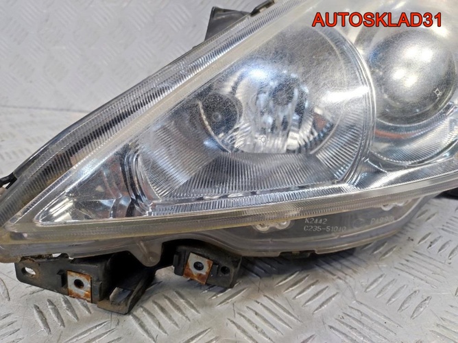 Фара левая Mazda 5 CR C23551040