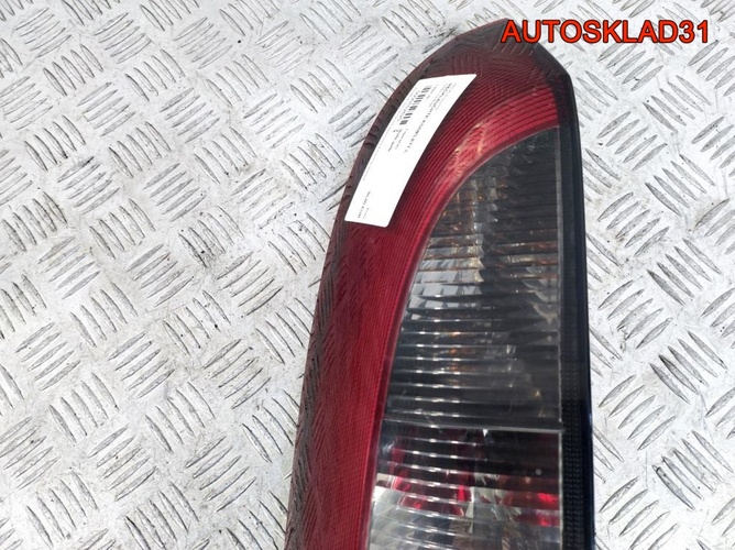 Фонарь задний левый Opel Corsa C 09114336 