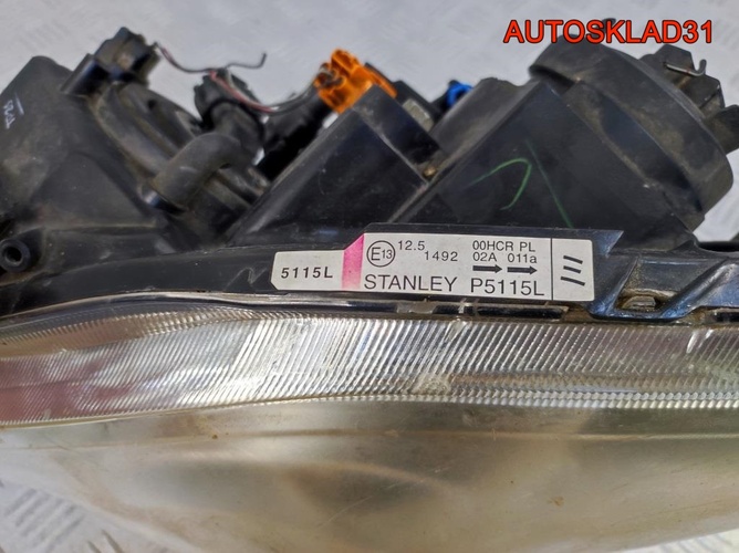 Фара левая Mazda 5 CR C23551040