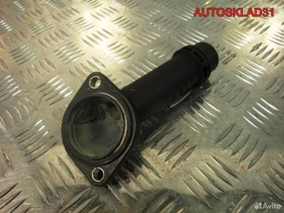 Фланец системы охлаждения VW Passat B5+ 038121121B - АвтоСклад31.рф - авторазборка контрактные б/у запчасти в г. Белгород